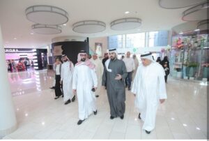 MOHAMMED WITH THE MINSTER OF SPORTS AND YOUTH H.E AYMEN AL MOAYED & MR. YOUNIS AL KOOHEJI BAHRAIN PHILATELIC SOCIETY PRESIDENT