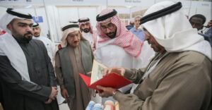 MOHAMMED WITH THE MINSTER OF YOUTH H.E AYMEN AL MOAYED